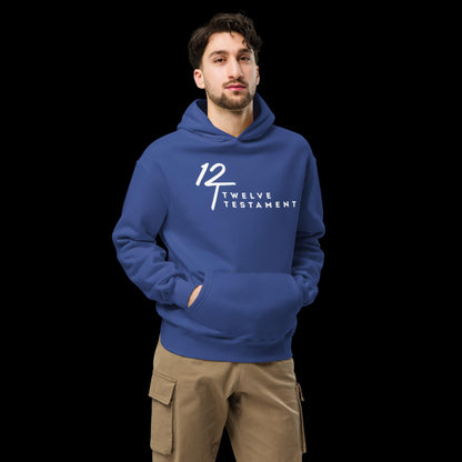 Cobalt Blue Christian Hoodie – Unisex oversized hoodie with white “12 Twelve Testament” faith logo, comfortable and bold streetwear style modeled with khaki cargo pants.
